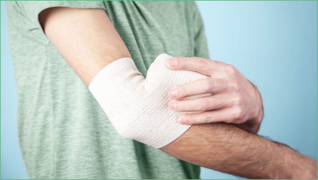 Treat Tennis Elbow at Home with Self Reliant Wrap and Tape Techniques Today