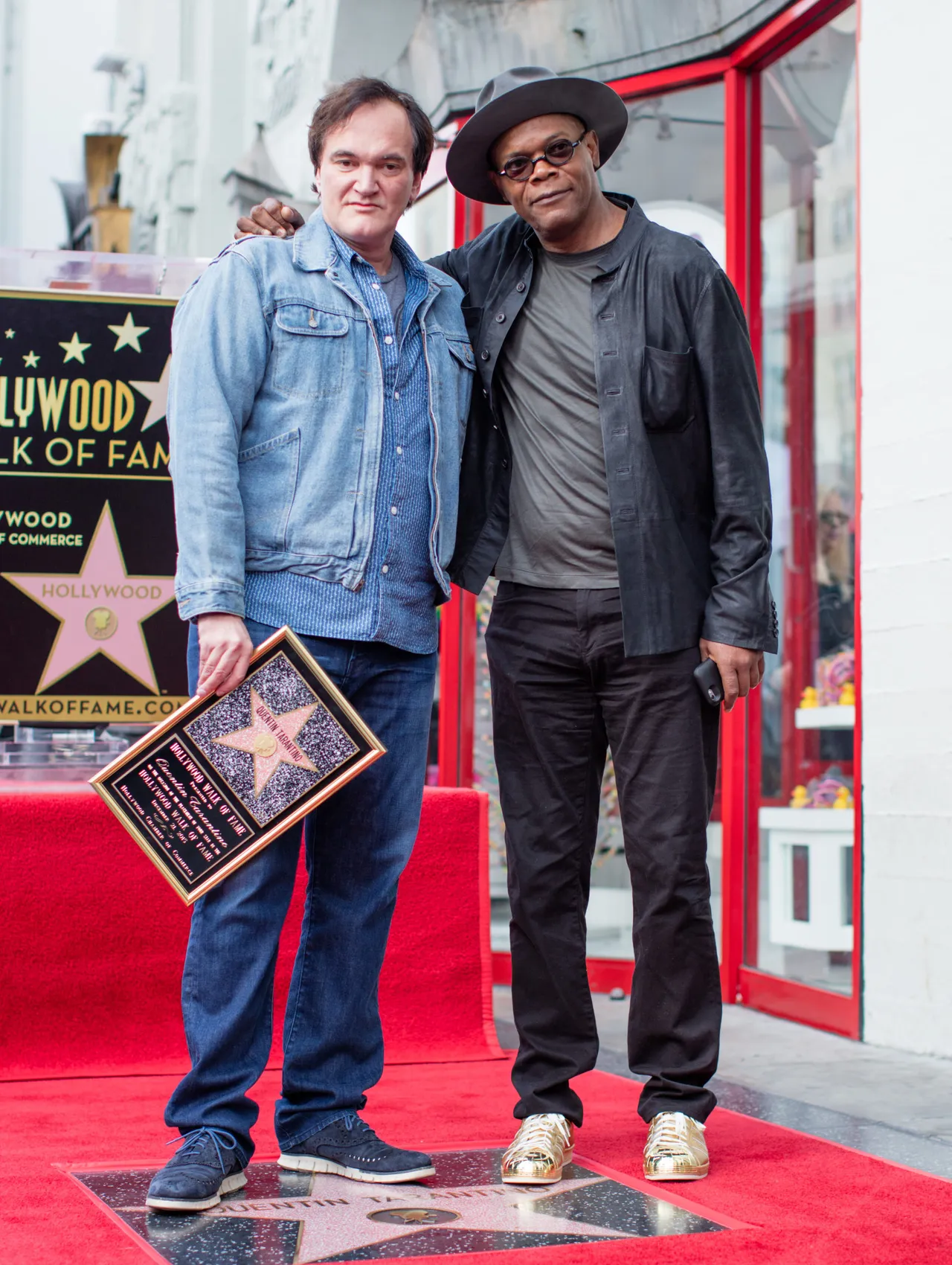 HOLLYWOOD, CA - DECEMBER 21: Filmmaker and Director Quentin Tarantino and actor Samuel L. Jackson pose at the Hollywood Walk of Fame on December 21, 2015 in Hollywood, California. (Photo by Mark Davis/Getty Images)