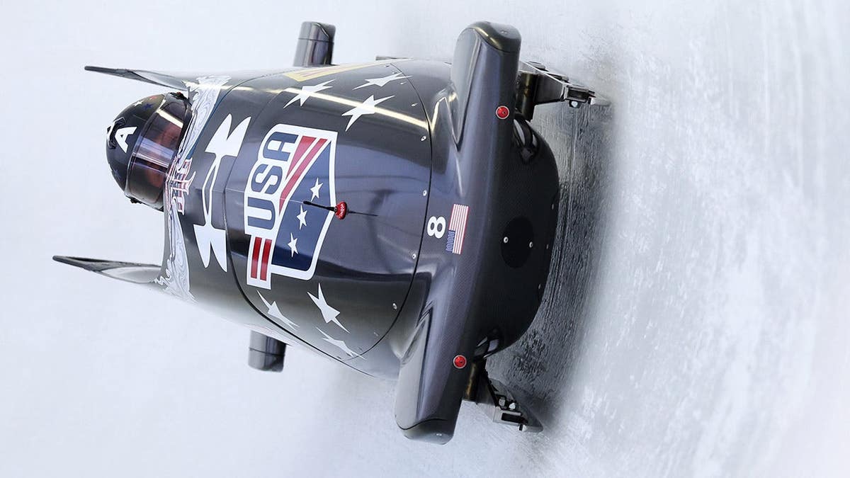 Elana Taylor Meyers and Lolo Jones compete in two-woman bobsleigh heat at Mt Van Hoevenberg.