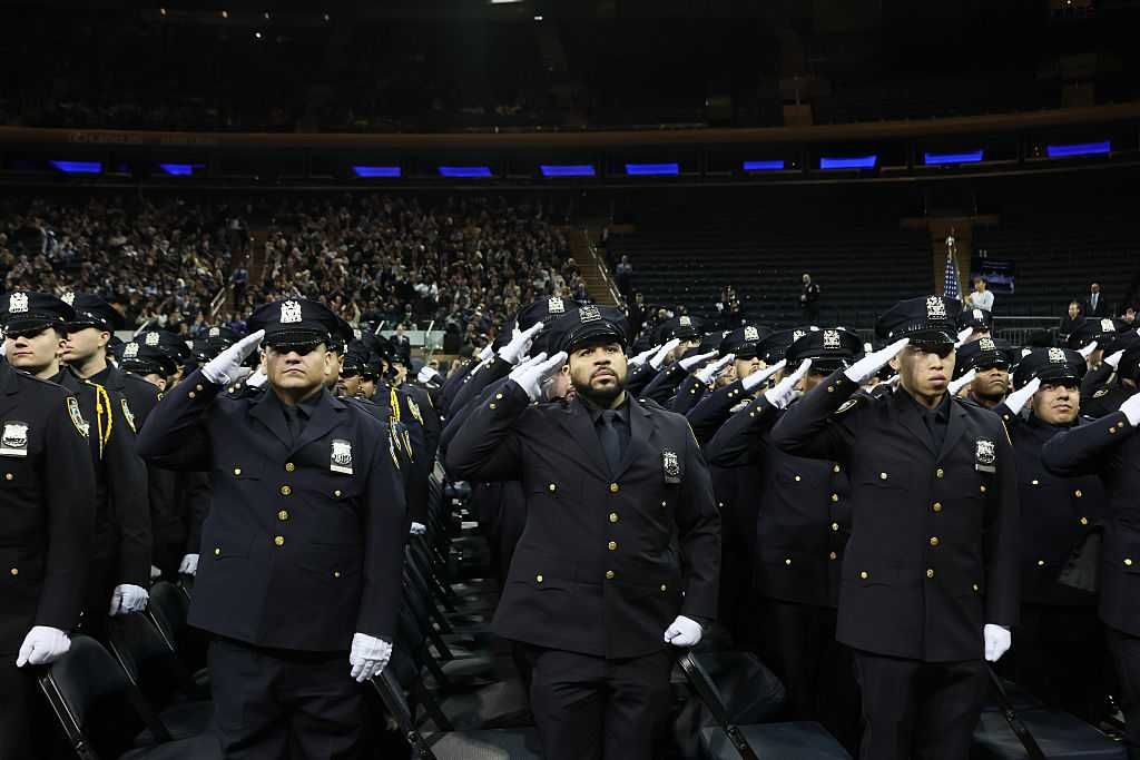 NYPD graduates salute
