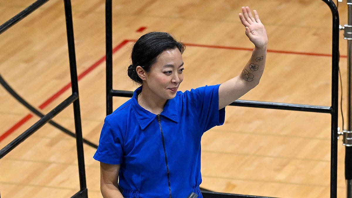 Francesca Hong waving