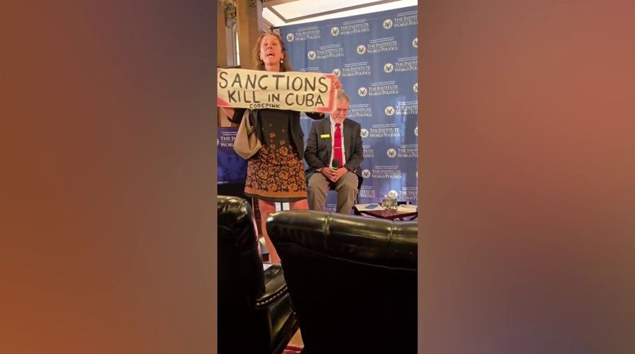 CodePink activist disrupts Cuba national security panel, gets escorted out